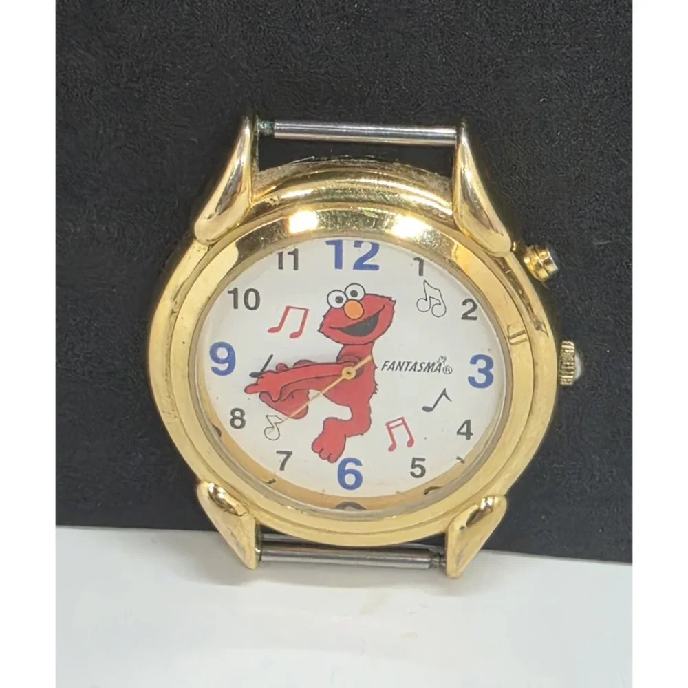 Henson Fantasma Elmo Sesame Street Musical Watch Gold Tone Tested Works No Band